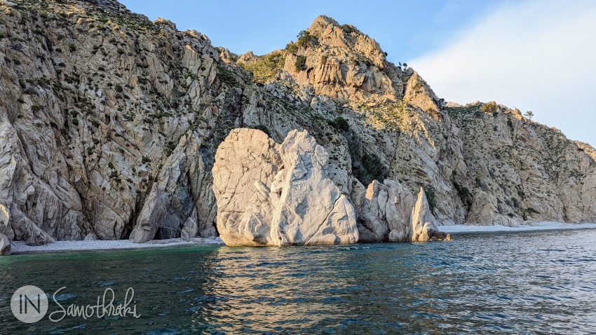 A landscape of abrupt cliffs, stretches of beach and massive rocks