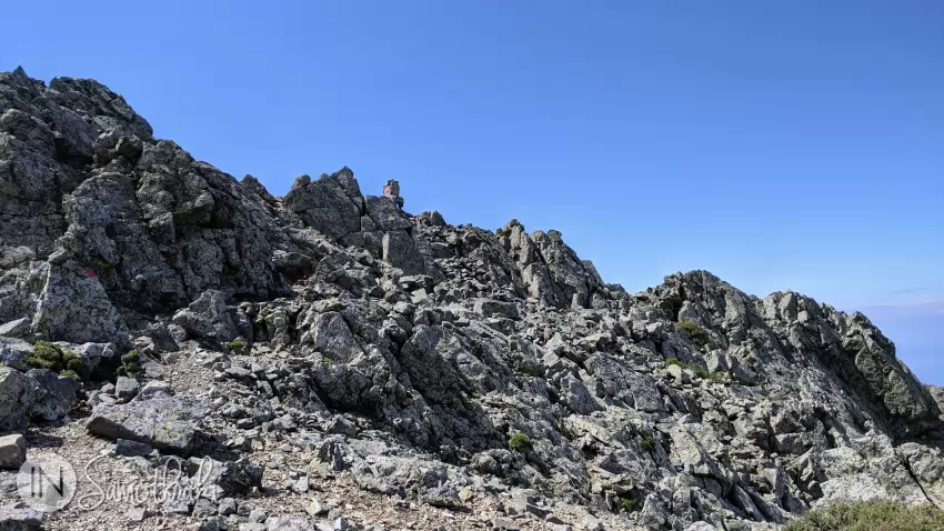 The first of the three peaks sits at an altitude of 1
