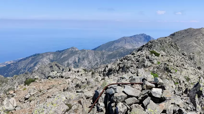 There is no official marker pillar on the actual Fengari Peak..