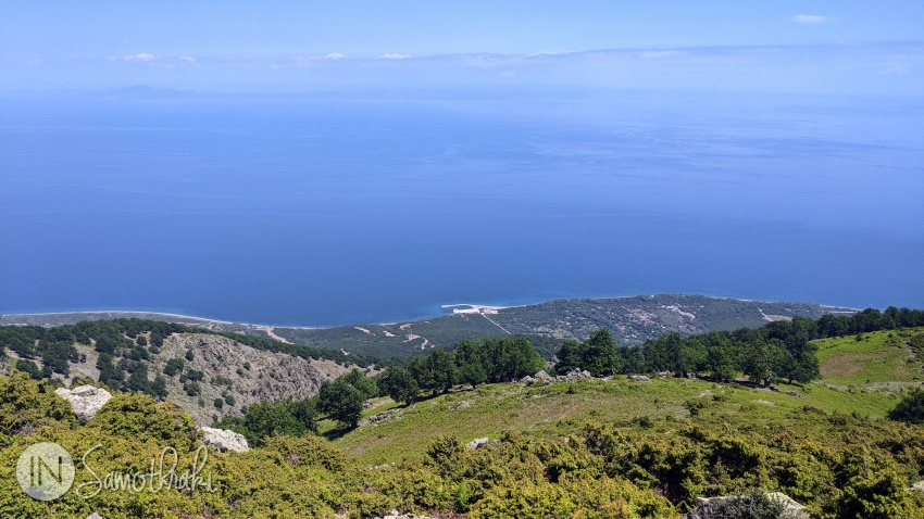 Below, the port and Therma Beach come into view.