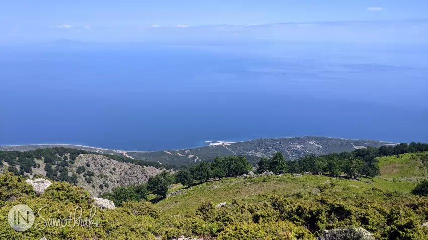 Below, the port and Therma Beach come into view.