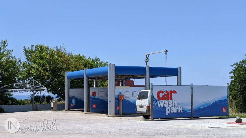 The self-service carwash next to the gas station.