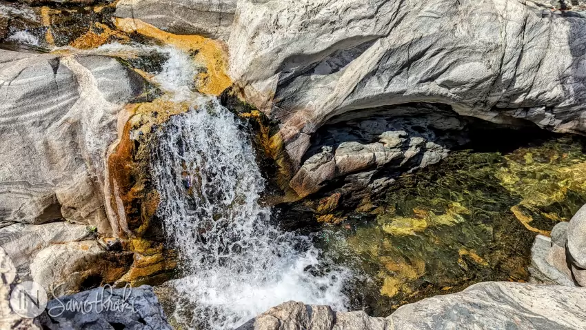 The water makes its way through stone.