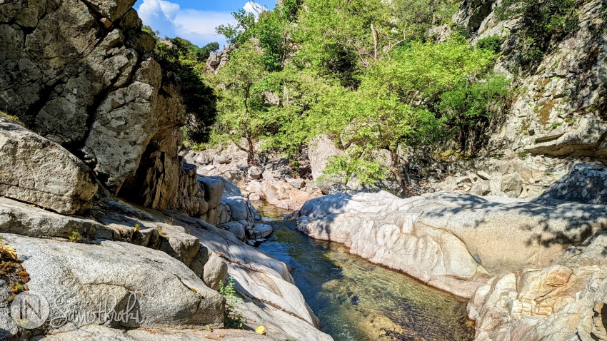 At about 45 minutes from the first sign you will descend into the river valley.