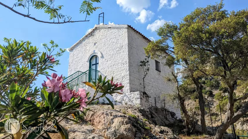 The church is small and painted white.