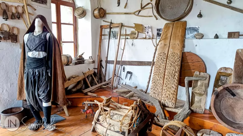 Objects used by breeders on the left and tools used in agriculture on the right