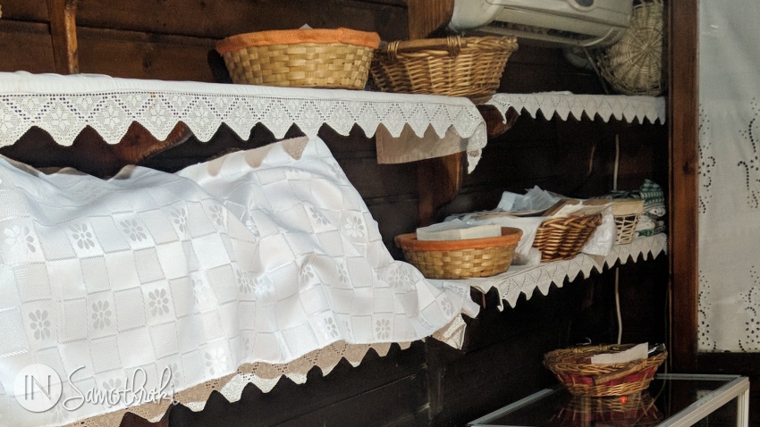 The goodies hide in baskets, on shelves covered with traditional towels