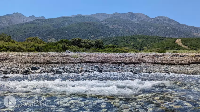 The imposing silhouette of Mount Saos as seen from the water