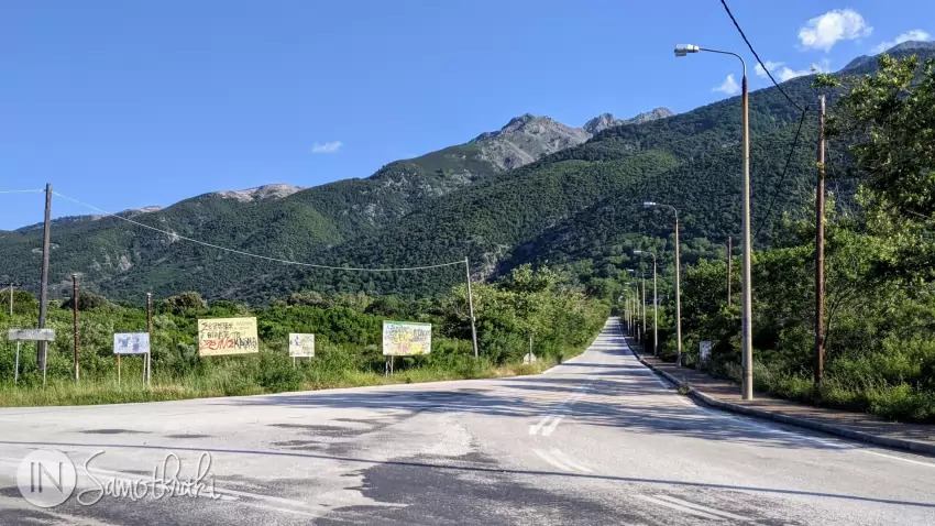 Therma is at the end of this road, surrounded by vegetation.